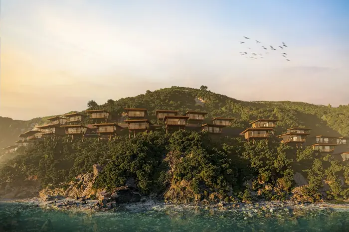 The beach hotel on the hill at golden hour · artist's impression